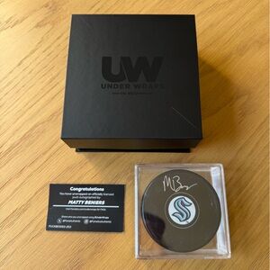 2025 Under Wraps NHL Autographed Puck Signed Matty Beniers Kraken Fanatics